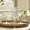 Four Fluted Wine Glasses