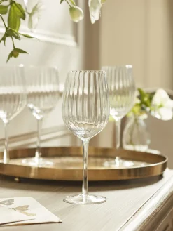 Four Fluted Wine Glasses