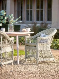 Two Open Weave Dining Chairs
