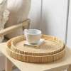 Two Round Rattan Trays