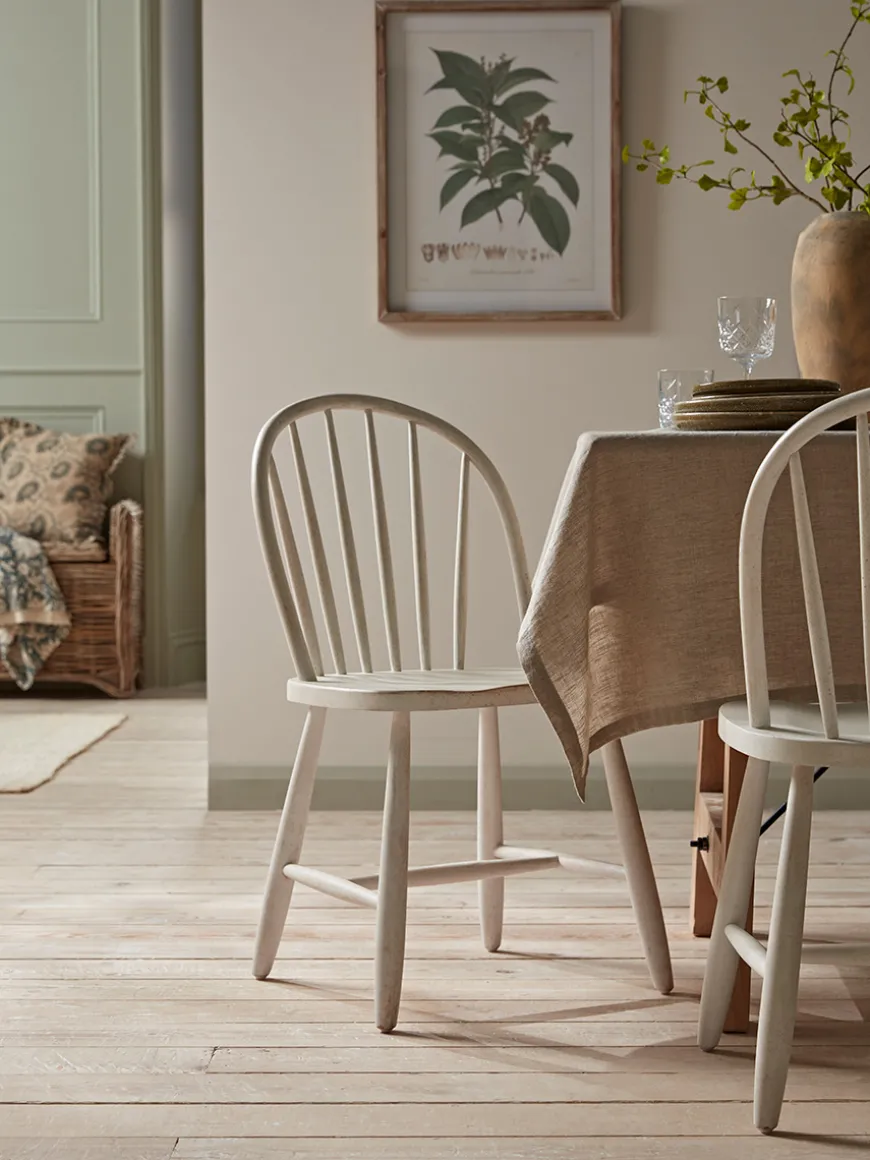 Two White Spindleback Dining Chairs