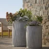 Two zinc Barrel Planters