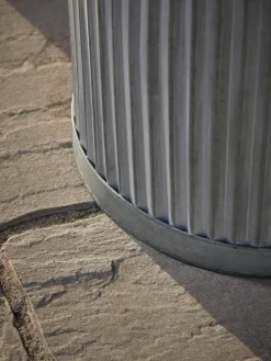 Two zinc Barrel Planters